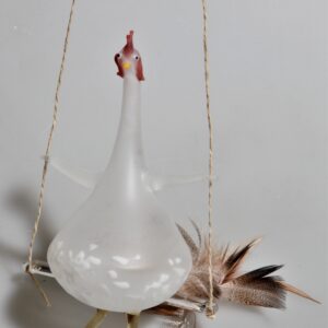 Huhn auf der Schaukel